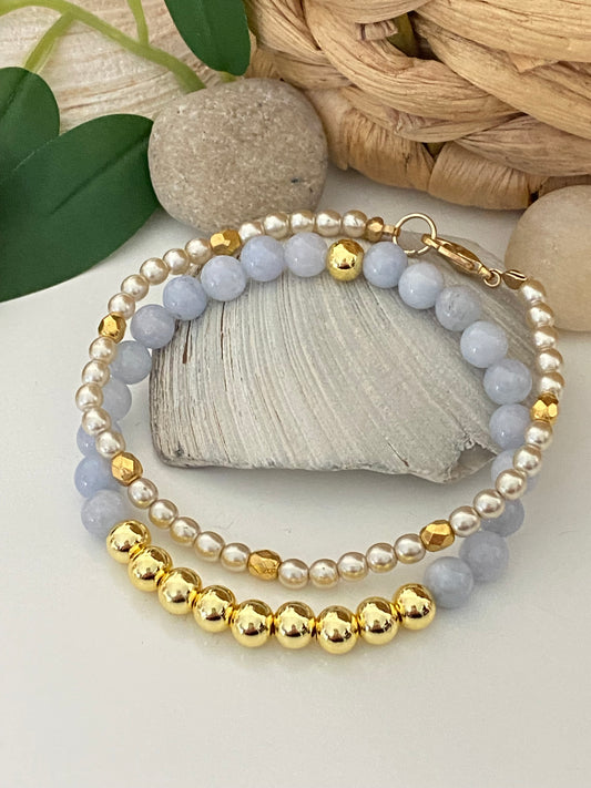 Pila de oro con aguamarina y perla