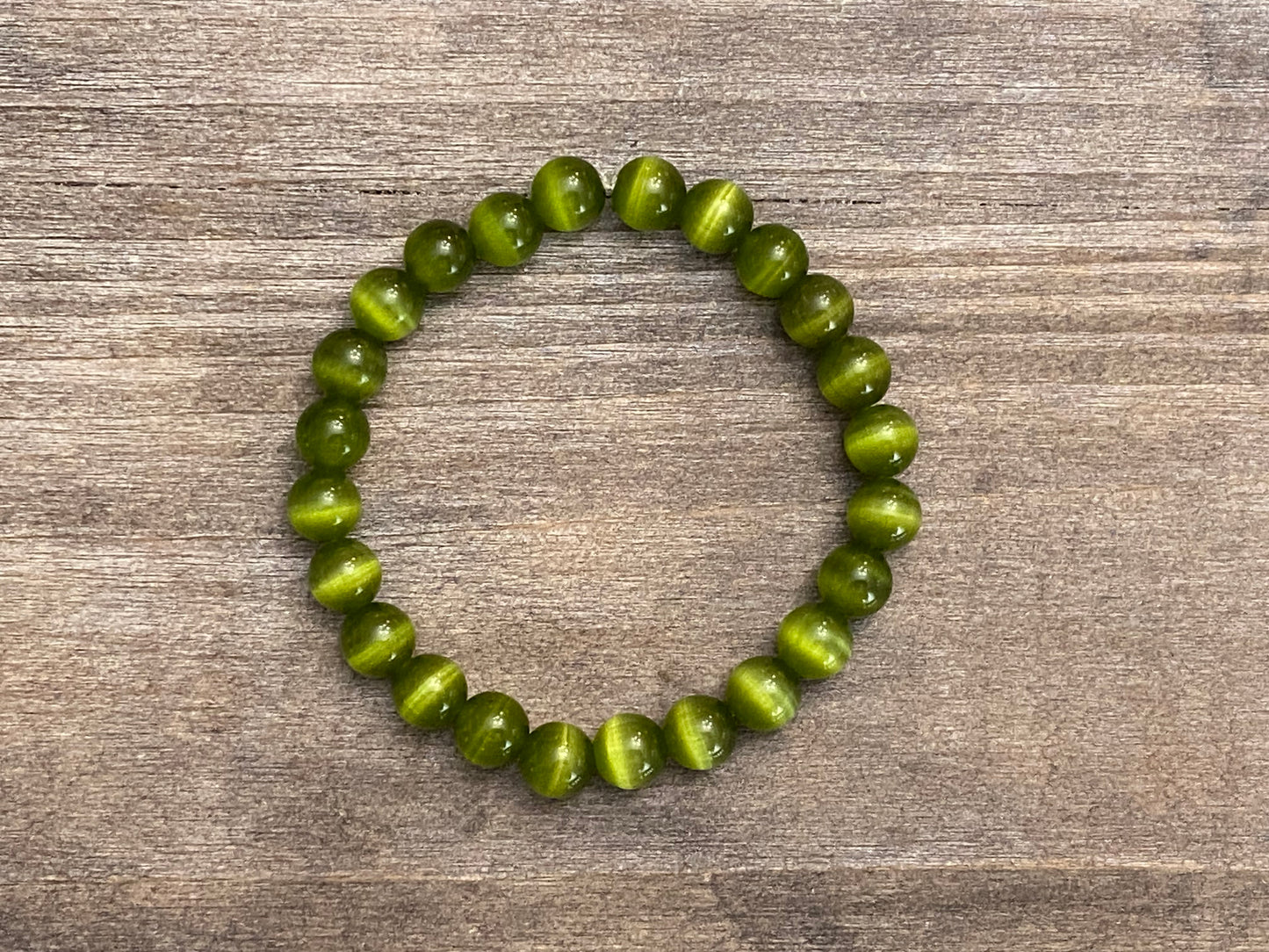 Bracelet œil de chat vert olive