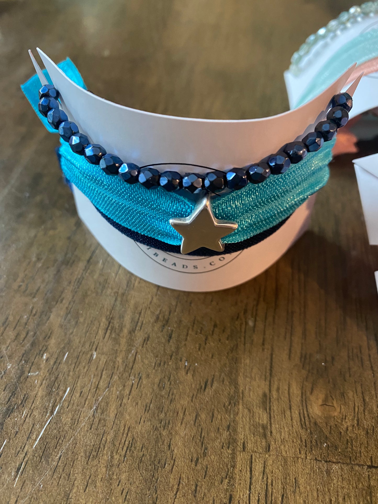 Conjunto de cinta para el pelo y pulsera